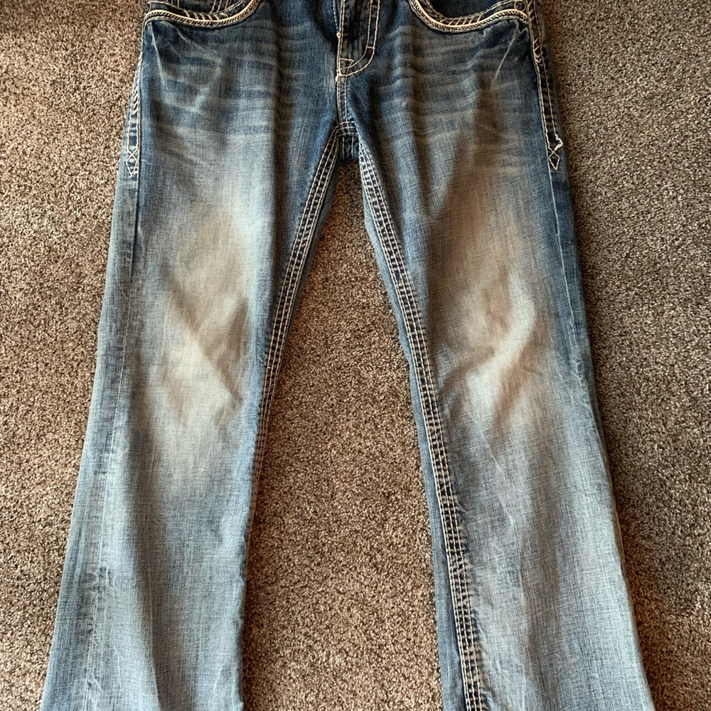 Used rock revival jeans